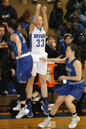 Rachael Miller launched a 3-point shot as a pair of Conway defenders try to get out to defend it. (Photo by Rick Nation)