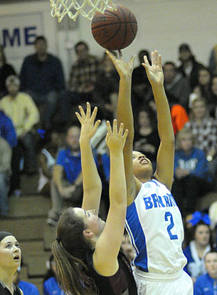 Raven Loveless (2) puts up a shot inside. (Photo by Kevin Nagle)