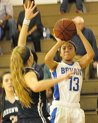 Raija Todd (13) eyes the basket. (Photo by Kevin Nagle)
