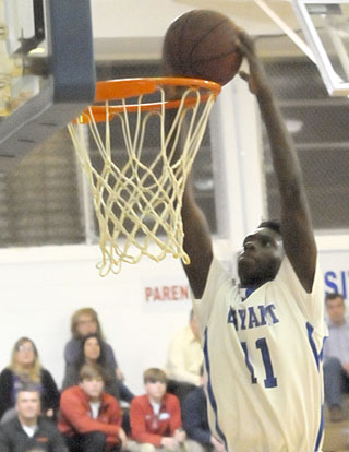 Kevin Hunt prepares to rattle the rim with his dunk. (Photo by Kevin Nagle)