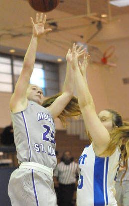 Anna Turpin, right, defends against Mount St. Mary's Anna Crawford. (Photo by Kevin Nagle)