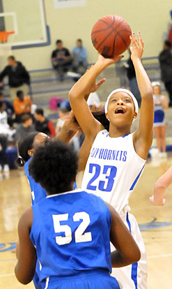 Allison Steen (23) tries to score in traffic. (Photo by Kevin Nagle)