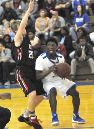 Calvin Allen tries to get around Russellville's Matt Laws. (Photo by Kevin Nagle)