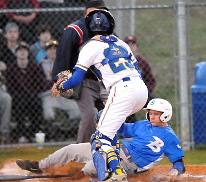 Jake East scores on a short sacrifice fly. (Photo by Kevin Nagle)