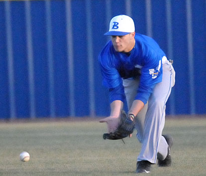 Austin Kelly charges a ball in right field. (Photo by Kevin Nagle)