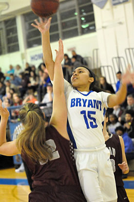 Emily Ridgell (15) finished with 17 points and nine rebounds in her final home game. (Photo by Kevin Nagle)