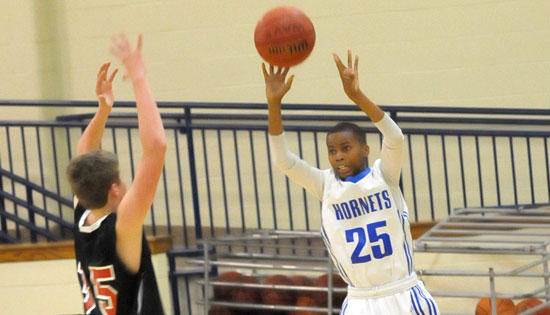 Keyshawn Scott (25) releases a jumper. (Photo by Kevin Nagle)