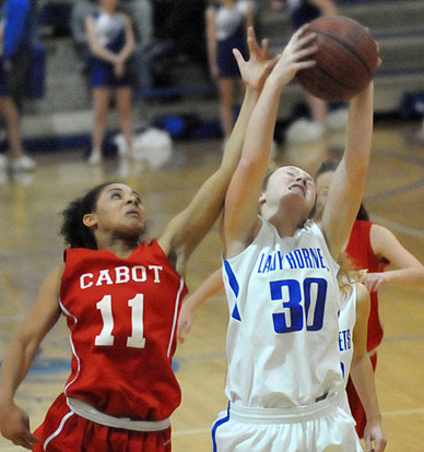 Allie Dugan fights for a rebound. (Photo by Kevin Nagle)