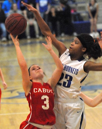 Allison Steen (23) blocks a shot. (Photo by Kevin Nagle)
