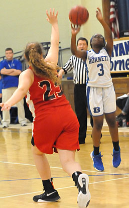 Sierra Trotter (3) fires up a jumper from the wing. (Photo by Kevin Nagle)