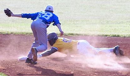 Seth Tucker (28) stays with the play and tags out Catholic's Lance Harville-Thomas after he slid beyond the second-base bag on a steal attempt. (Photo courtesy of Paul Dotson)