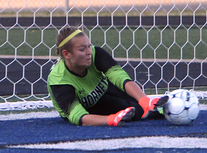 Keeper Brittney Warner stops a Conway penalty kick during Thursday night's shootout. (Photo by Rick Nation)