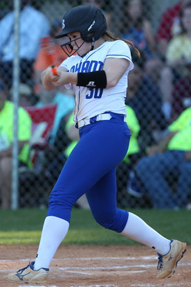 Brooklyn Trammell follows through on her home-run swing in the top of the seventh. (Photo by Rick Nation)