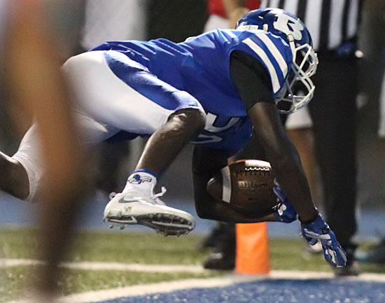 Bryant running back Jeremiah Long dives across the goal line for a touchdown. (Photo by Rick Nation)