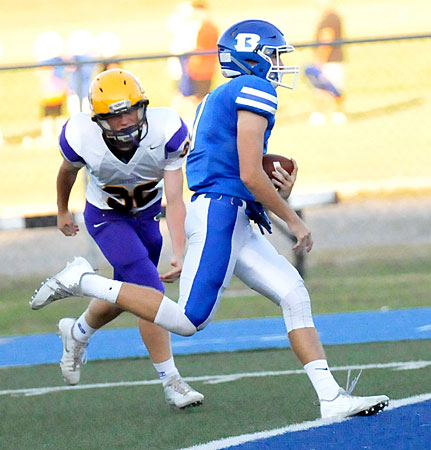 Junior Cameron Vail finishes off a touchdown run. (Photo by Kevin Nagle)