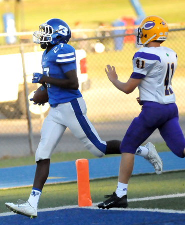 Randy Thomas crossed the goal line ahead of a Catholic defender. (Photo by Kevin Nagle)