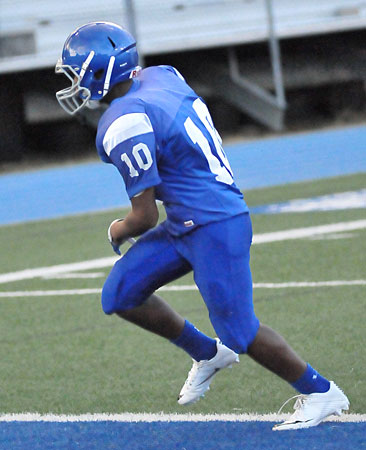 Xavier Foote finishes off his 8-yard touchdown run. (Photo by Kevin Nagle)