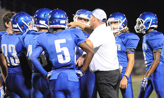 Bryant freshman defensive coach John Orr instructs his charges during a break in Thursday's action. (Photo by Kevin Nagle)