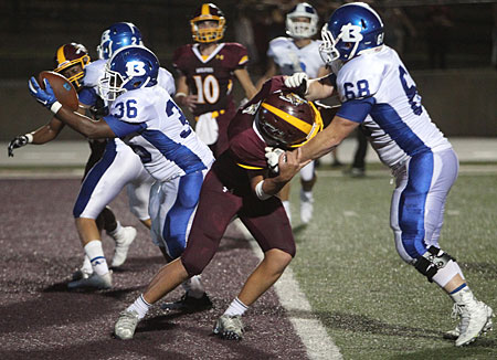 Kris King (36) finds the end zone with the help of a block from Chandler Davis (68). (Photo by Rick Nation)