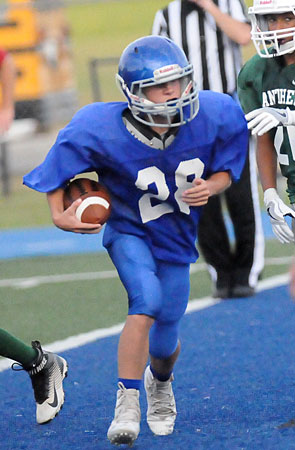 Lawson Speer (28) steps into the end zone for a game-tying two-point conversion. (Photo by Kevin Nagle)