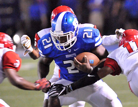 Cameron Coleman is surrounded by Northside defenders. (Photo by Kevin Nagle)
