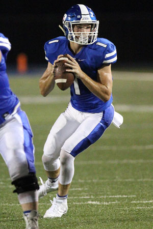 Cameron Vail looks for an open receiver. (Photo by Rick Nation)