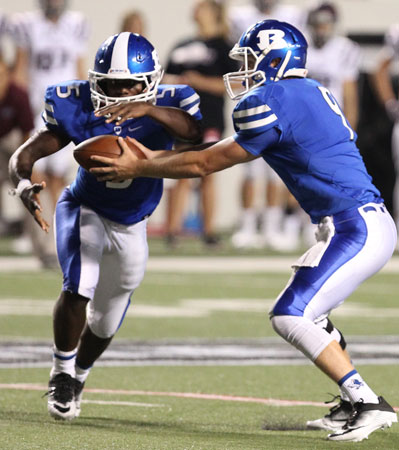 DeAmonte Terry takes a handoff. (Photo by Rick Nation)