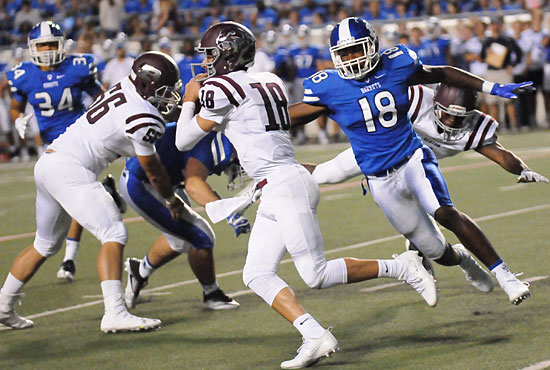 Marvin Moody (18) pursues the play. (Photo by Kevin Nagle)