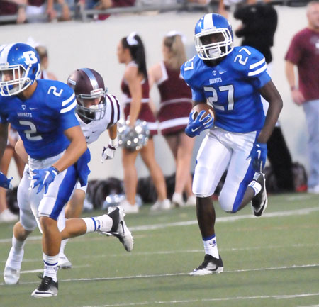 Landon Smith (2) leads the blocking for Randy Thomas on a kickoff return. (Photo by Kevin Nagle)
