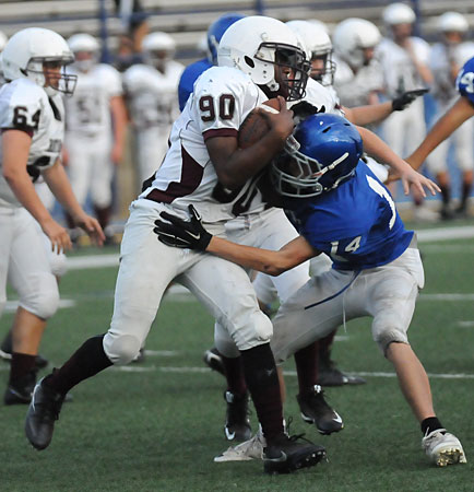 Devyn Spurgeon makes a tackle. (Photo by Kevin Nagle)