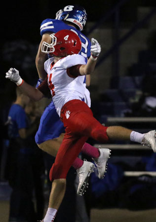 Luke Curtis beats Cabot's Cody Nabors for a touchdown pass. (Photo by Rick Nation)