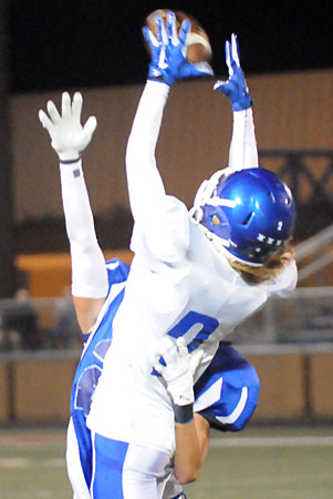 Gavin Wells makes a clutch catch to convert a third-down late in the game. (Photo by Kevin Nagle)