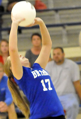 Lexi Brown sets for a teammate. (Photo by Kevin Nagle)