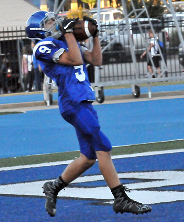 Ty Banks gathers in a touchdown pass. (Photo by Kevin Nagle)