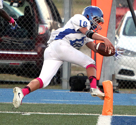 Austin Ledbetter reaches out to get the ball inside the pylon and over the goal line for a touchdown. (Photo by Rick Nation)