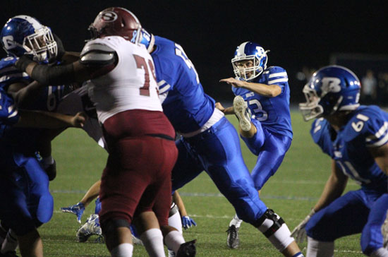 Hayden Ray boots his school record field goal. (Photo by Rick Nation)