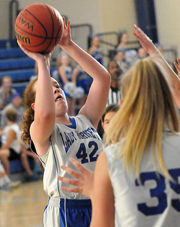 Taryn Keim eyes the basket. (Photo by Kevin Nagle)