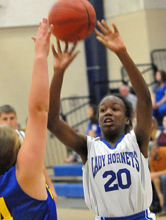 Jasmine Green fires a shot. (Photo by Kevin Nagle)