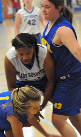 Bethel's Jade Rivers fights for a loose ball. (Photo by Kevin Nagle)