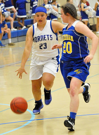 Bethel's Addison Funk drives up the court. (Photo by Kevin Nagle)