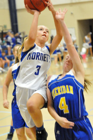 Ashton Inman tries to score in traffic. (Photo by Kevin Nagle)