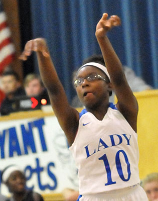 Tierra Trotter fires a 3-pointer. (Photo by Kevin Nagle)
