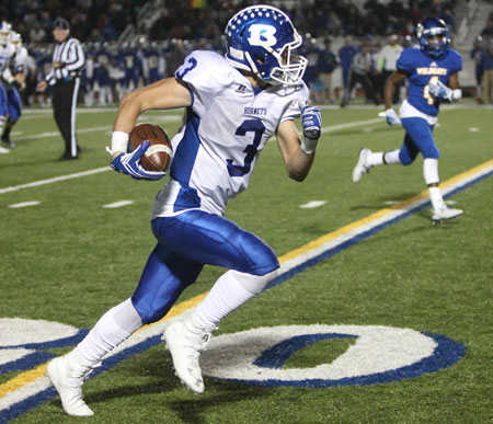 Reece Coates heads up the field after hauling in a pass. (Photo by Rick Nation)
