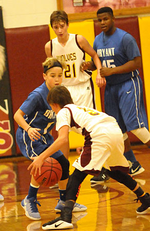 Caleb Goins applies defensive pressure. (Photo by Kevin Nagle)