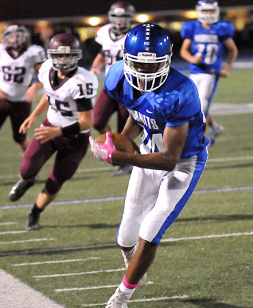 Catrell Wallace tightropes the sideline after a pass reception. (Photo by Kevin Nagle)