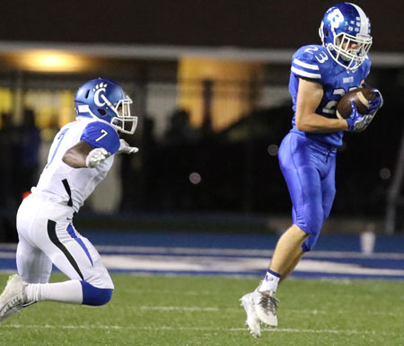 Michael Jones (23) intercepts a pass intended for Marquise Pleasant (7). (Photo by Rick Nation)