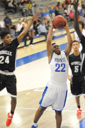 Marquelle Barnes (22) led the Hornets with 8 points Monday night. (Photo by Kevin Nagle)